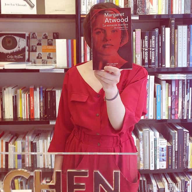 French Bookstore Librairie Mollat  Customers Strategically Posing With Perfectly Matching Book Covers